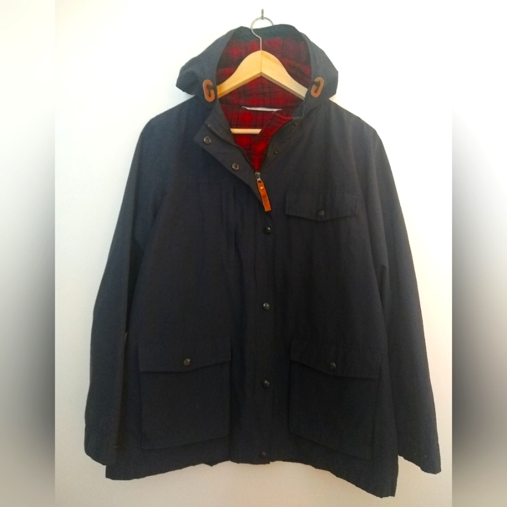 Woolrich navy blue lined raincoat.